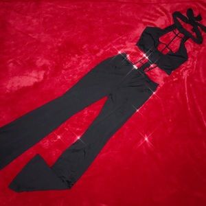 I AM GIA black high neck selene cutout flare jumpsuit